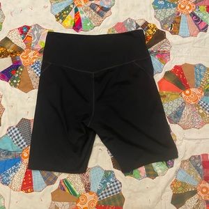 New size L black girlfriend collective high rise run/bike shorts.